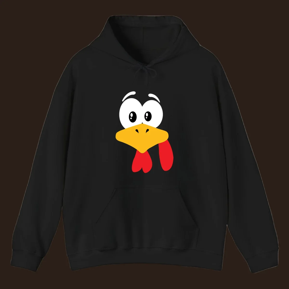 Funny cartoon turkey face graphic with googly eyes and a yellow beak.