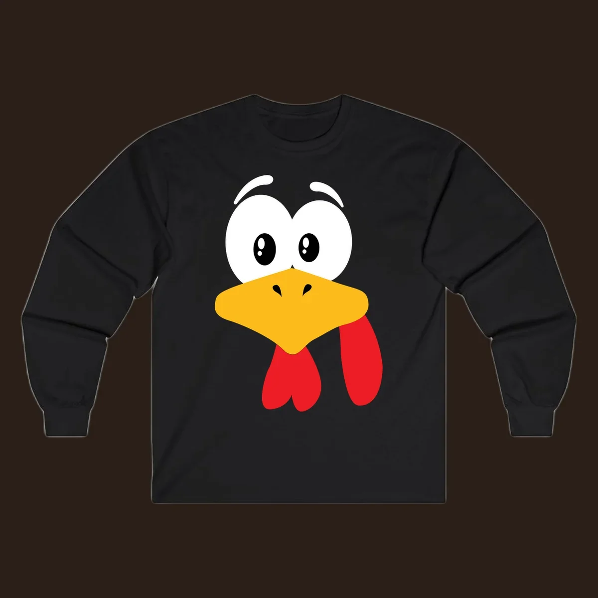 Funny cartoon turkey face graphic with googly eyes and a yellow beak.