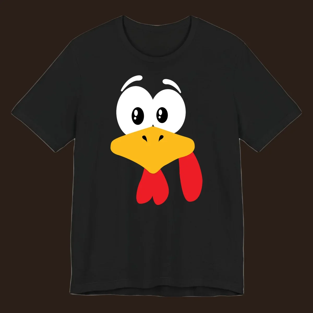 Funny cartoon turkey face graphic with googly eyes and a yellow beak.