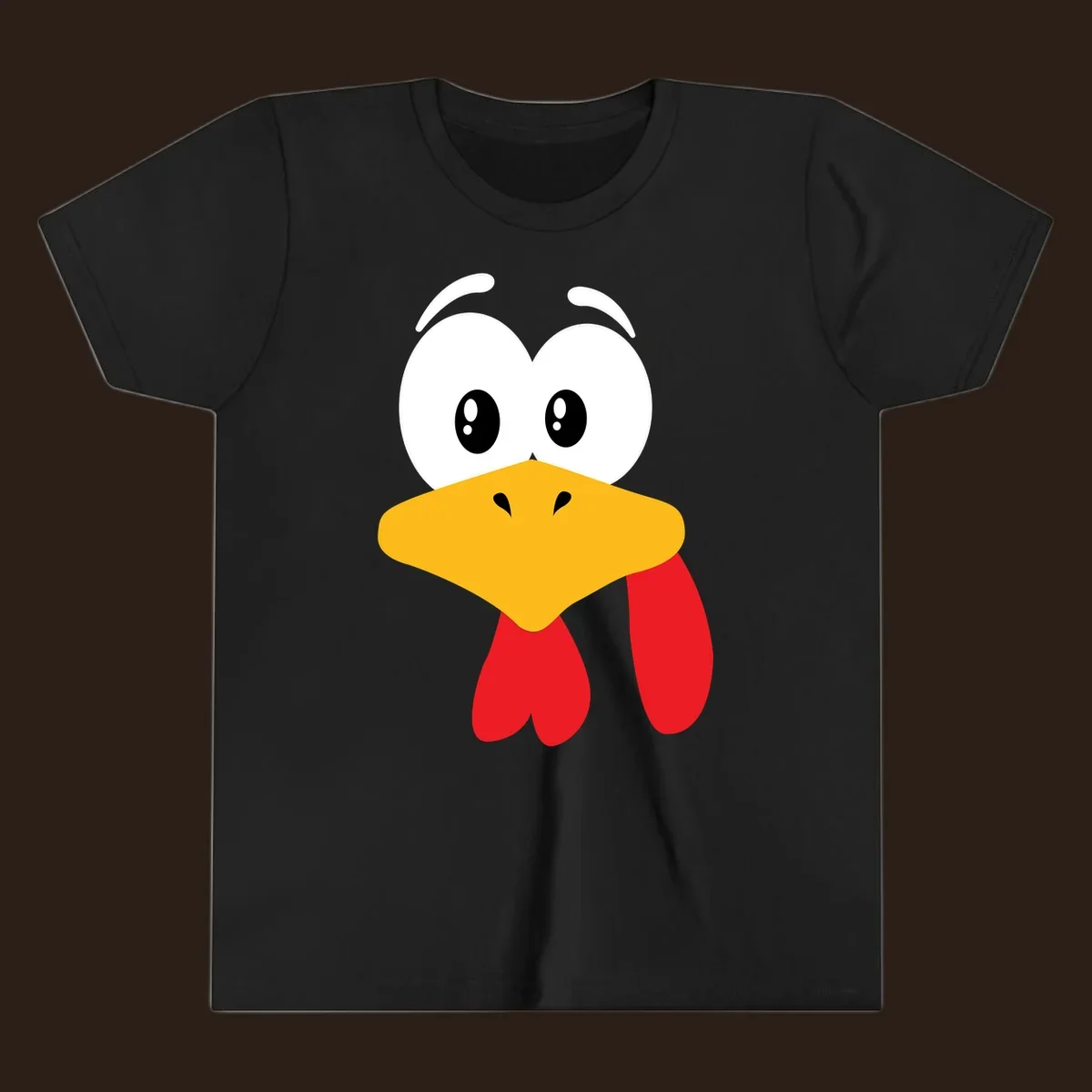 Funny cartoon turkey face graphic with googly eyes and a yellow beak.