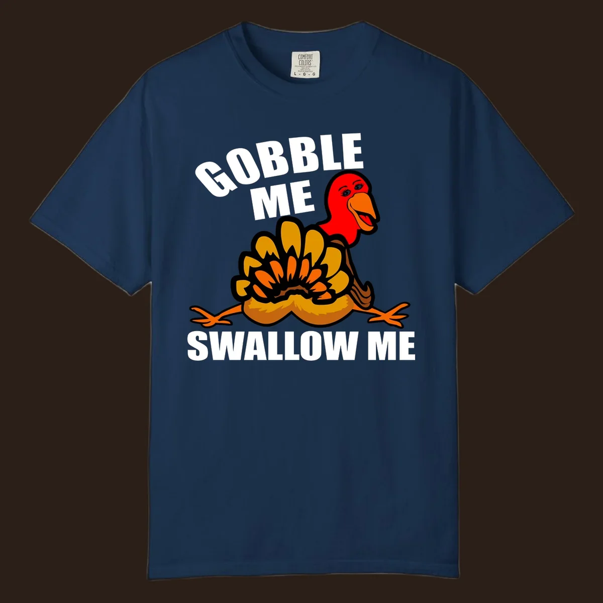 Funny Thanksgiving Gobble Me Swallow Me Turkey design with cartoon turkey and bold text.