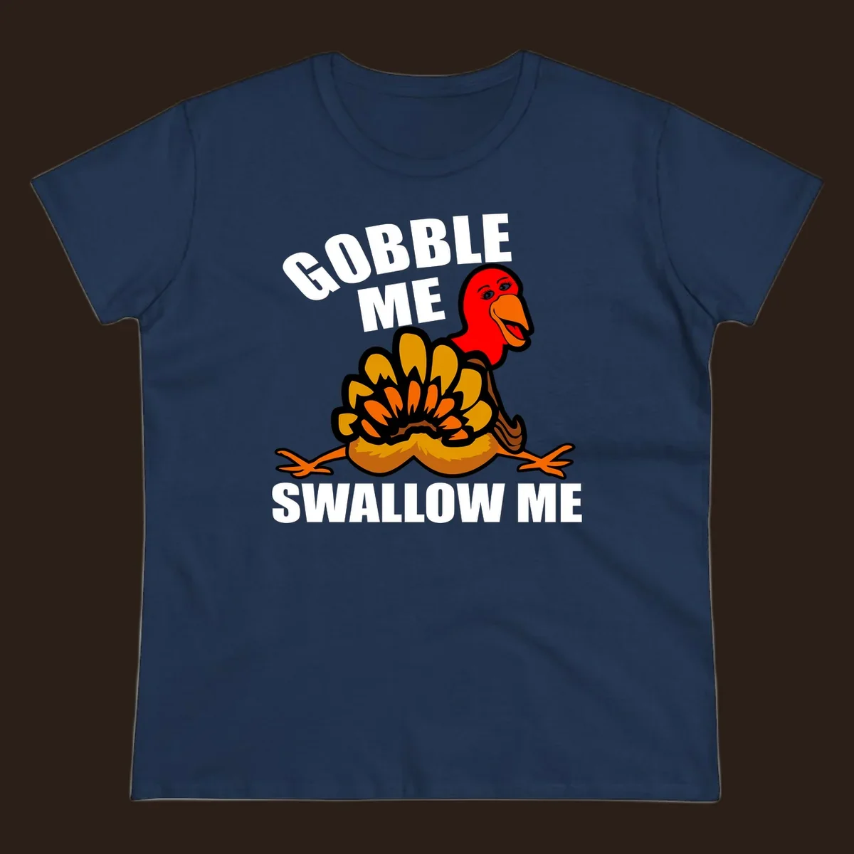 Funny Thanksgiving Gobble Me Swallow Me Turkey design with cartoon turkey and bold text.