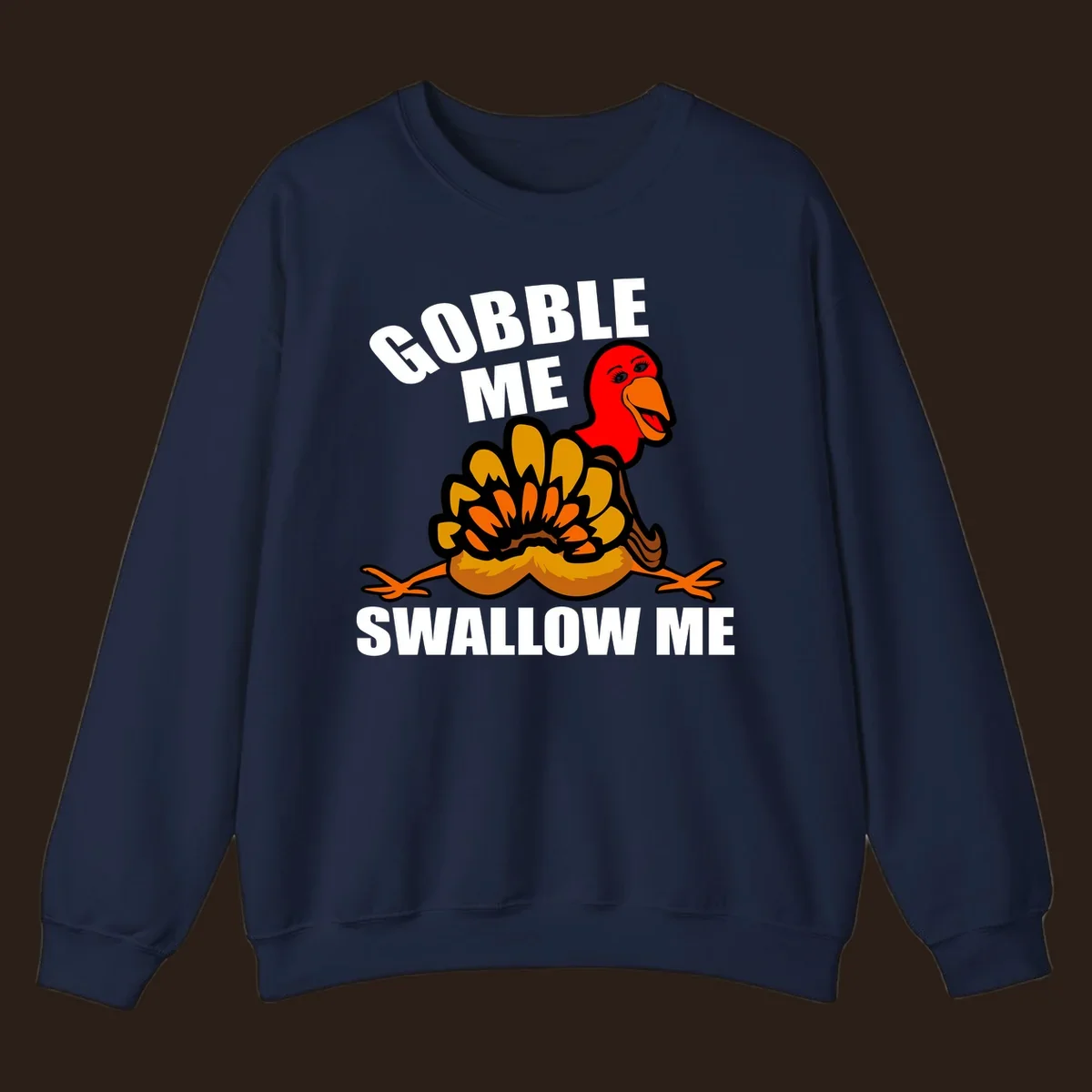 Funny Thanksgiving Gobble Me Swallow Me Turkey design with cartoon turkey and bold text.