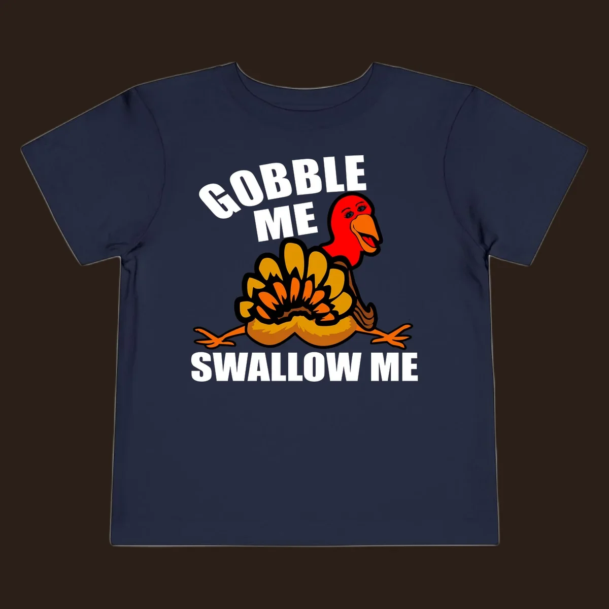 Funny Thanksgiving Gobble Me Swallow Me Turkey design with cartoon turkey and bold text.