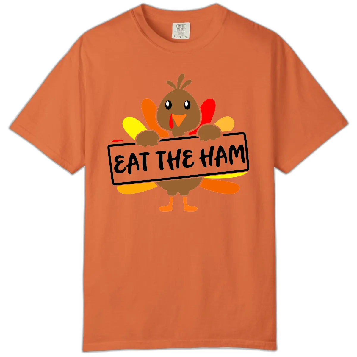 Turkey Holding Eat The Ham Sign Comfort Color in Burnt Orange