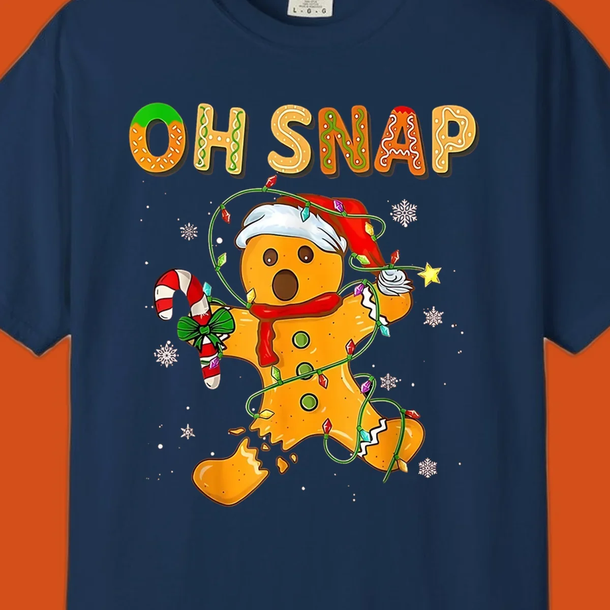 Oh snap gingerbread man tangled in christmas lights broken in half with text, funny holiday design.