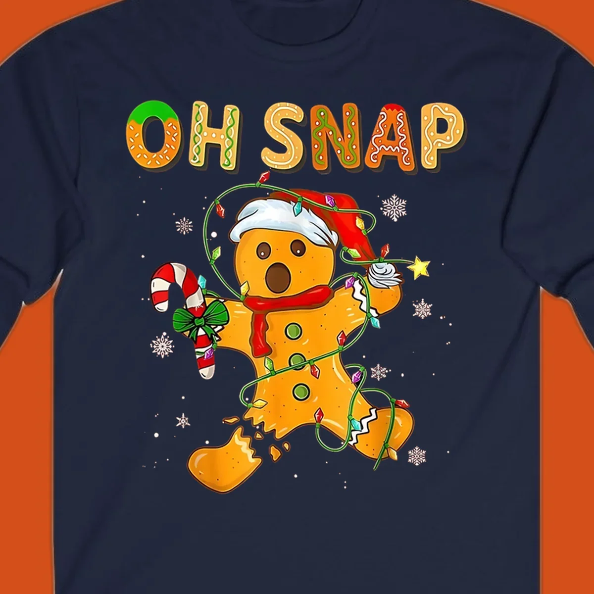 Oh snap gingerbread man tangled in christmas lights broken in half with text, funny holiday design.