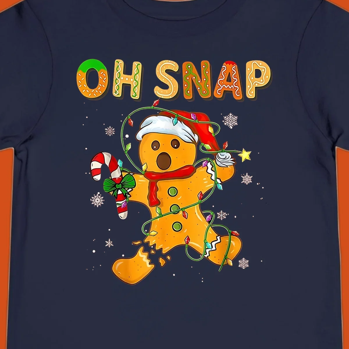 Oh snap gingerbread man tangled in christmas lights broken in half with text, funny holiday design.
