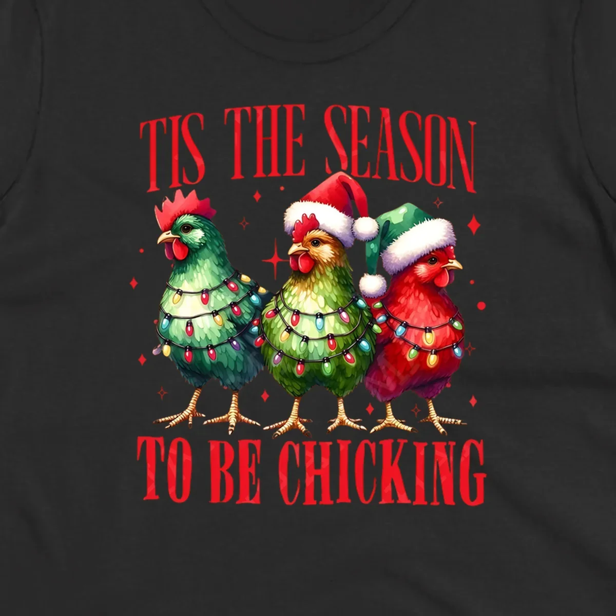 Christmas chickens wearing Santa hats and decorated with lights, with text 'Tis The Season To Be Chicking'.