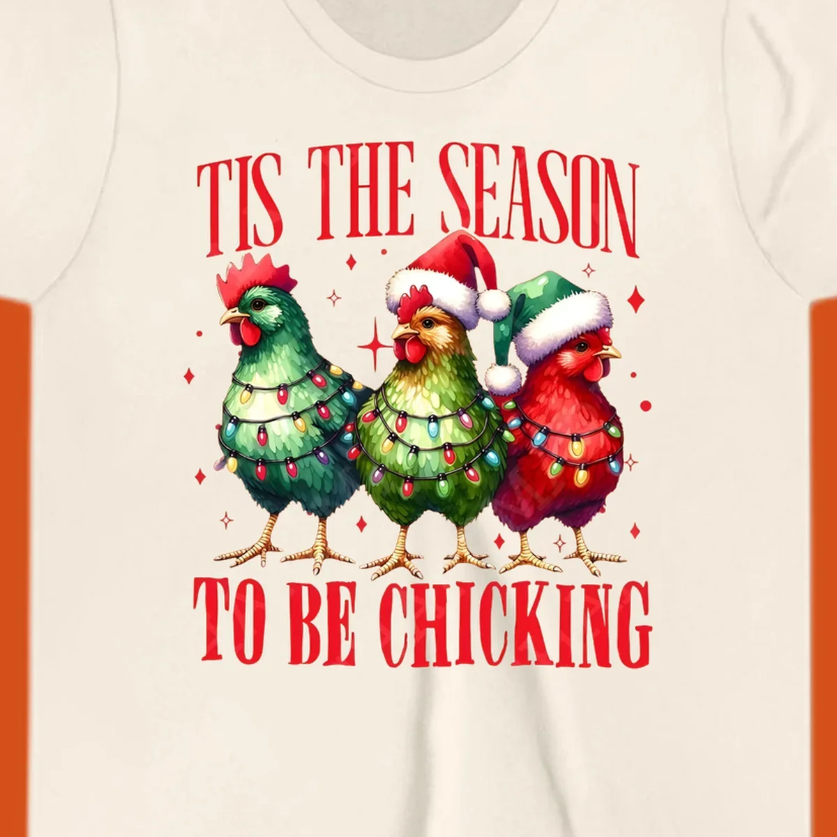 Christmas chickens wearing Santa hats and decorated with lights, with text 'Tis The Season To Be Chicking'.