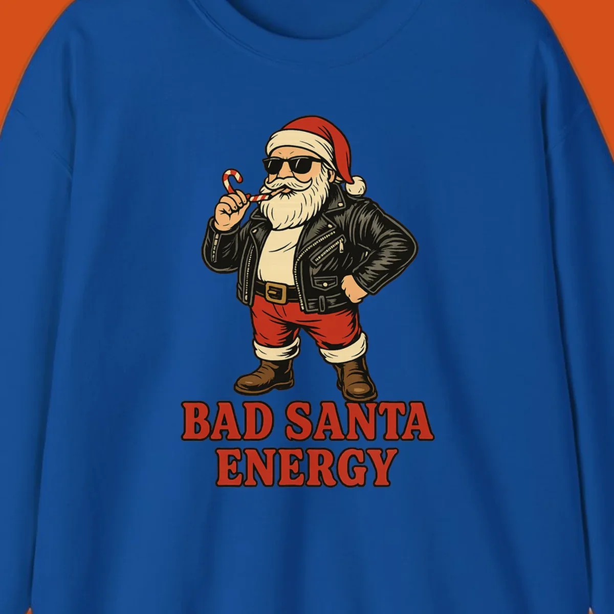Illustration of a cool, sunglasses-wearing Santa with a leather jacket and the text BAD SANTA ENERGY. Bad Santa Energy.