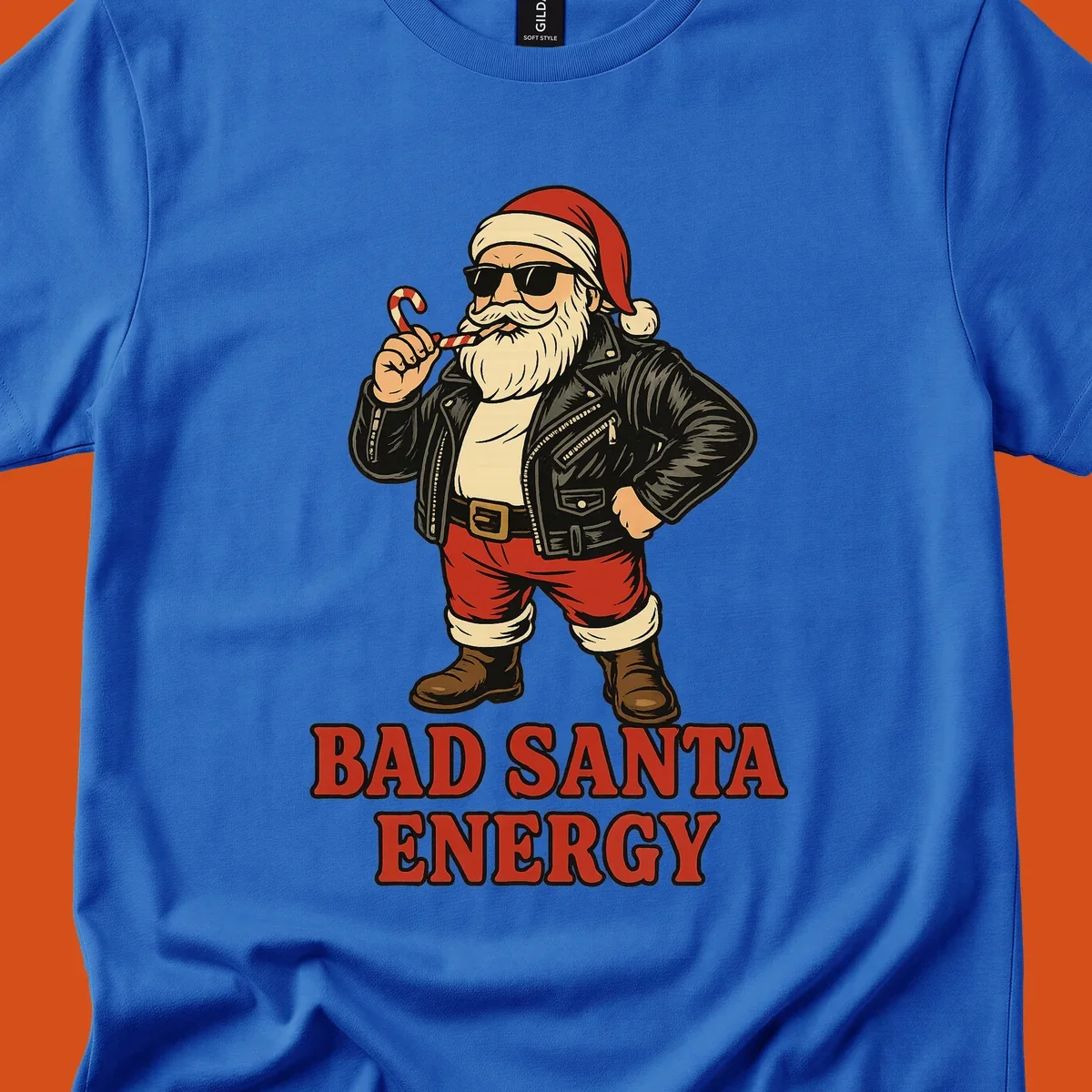 Illustration of a cool, sunglasses-wearing Santa with a leather jacket and the text BAD SANTA ENERGY. Bad Santa Energy.