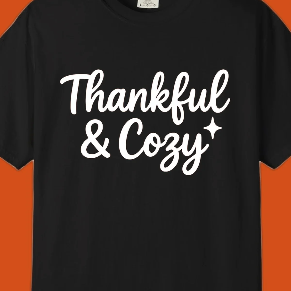 Thankful and cozy script text with starburst design.