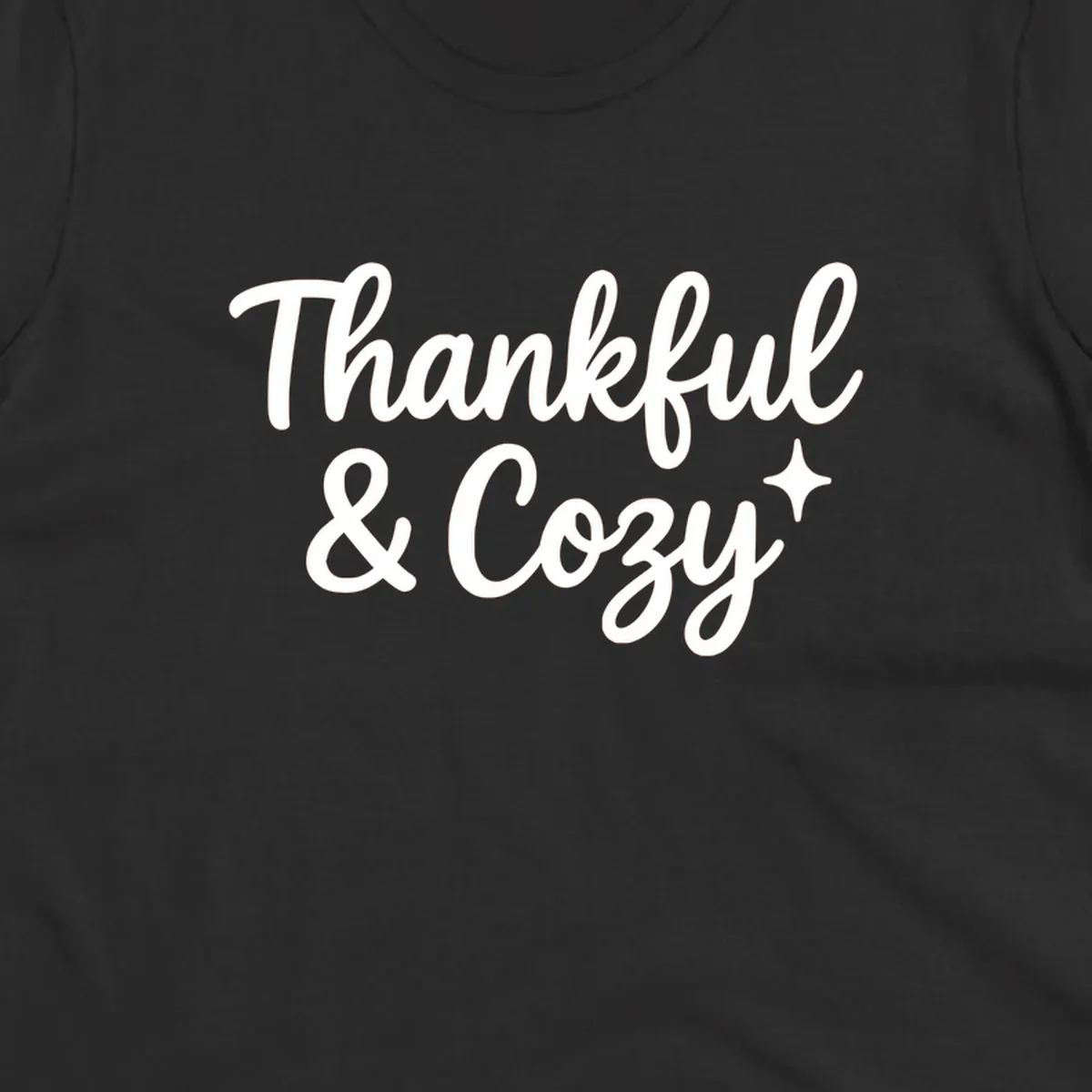 Thankful and cozy script text with starburst design.