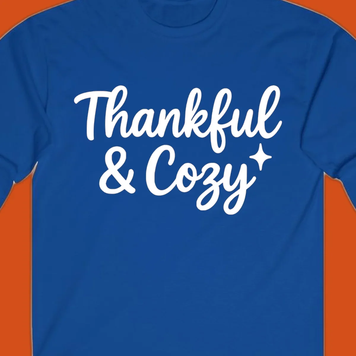 Thankful and cozy script text with starburst design.