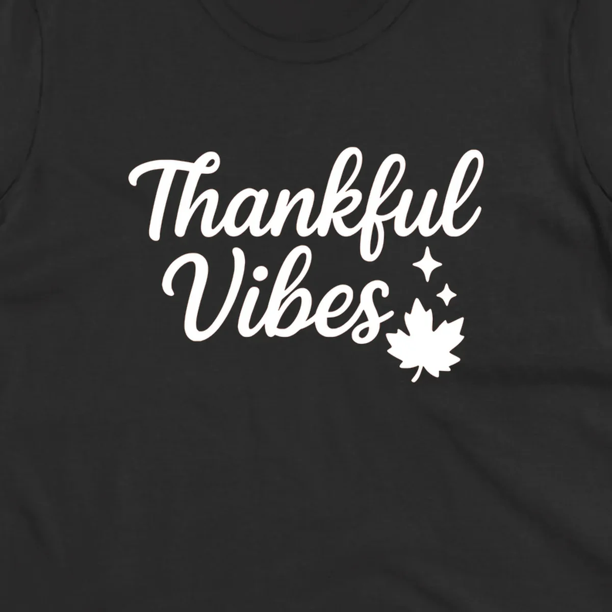 Thankful Vibes text with fall maple leaf and sparkles graphic.