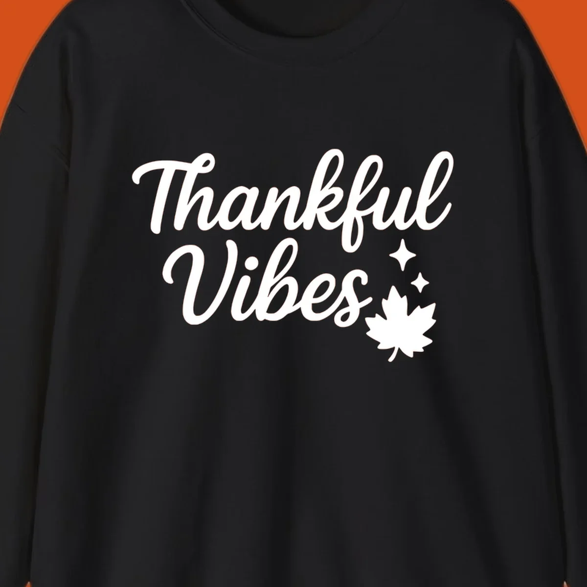 Thankful Vibes text with fall maple leaf and sparkles graphic.