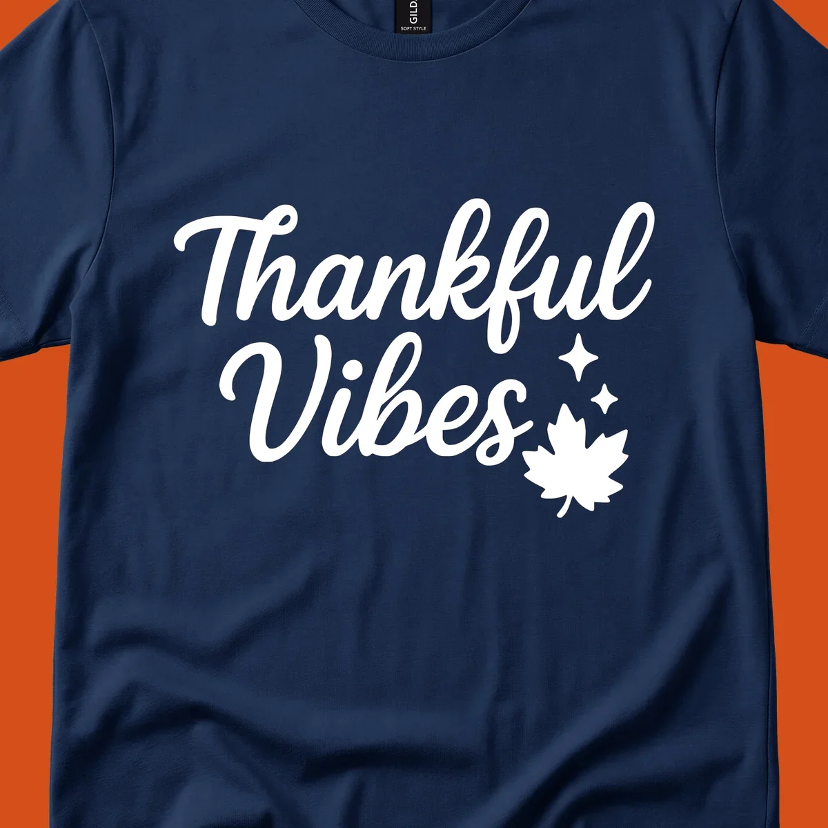 Thankful Vibes text with fall maple leaf and sparkles graphic.