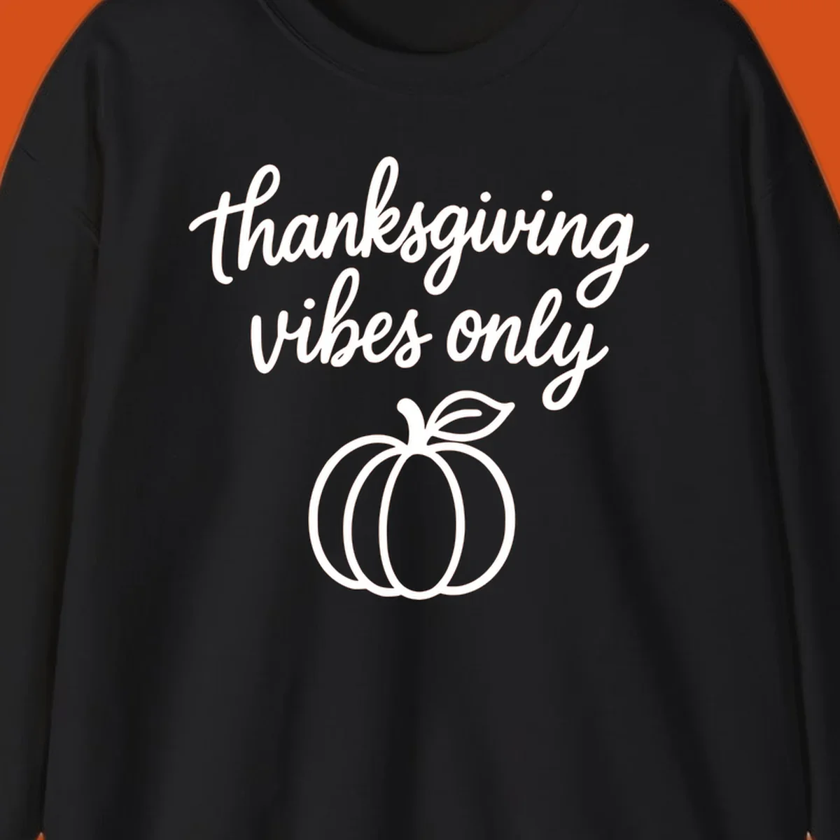 Thanksgiving vibes only text with a pumpkin graphic. Thanksgiving-vibes-only.