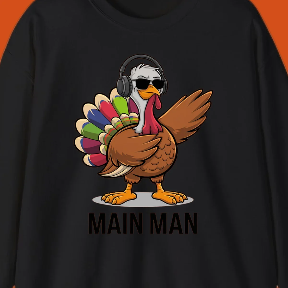 Thanksgiving turkey doing a dab, wearing headphones and sunglasses, with text 'MAIN MAN'.