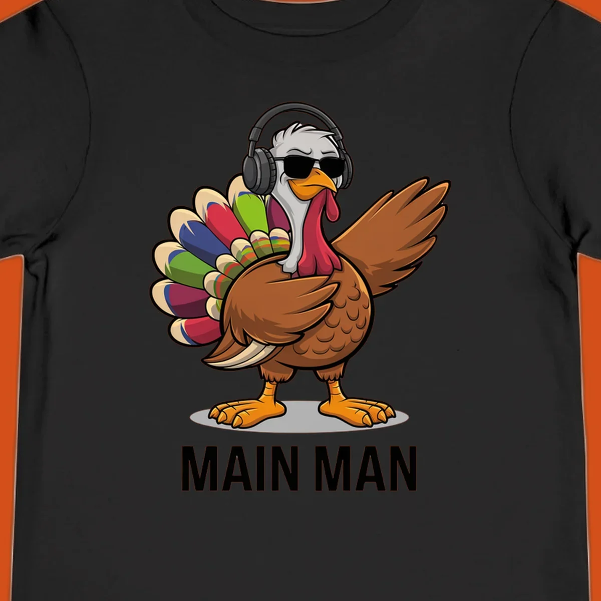 Thanksgiving turkey doing a dab, wearing headphones and sunglasses, with text 'MAIN MAN'.