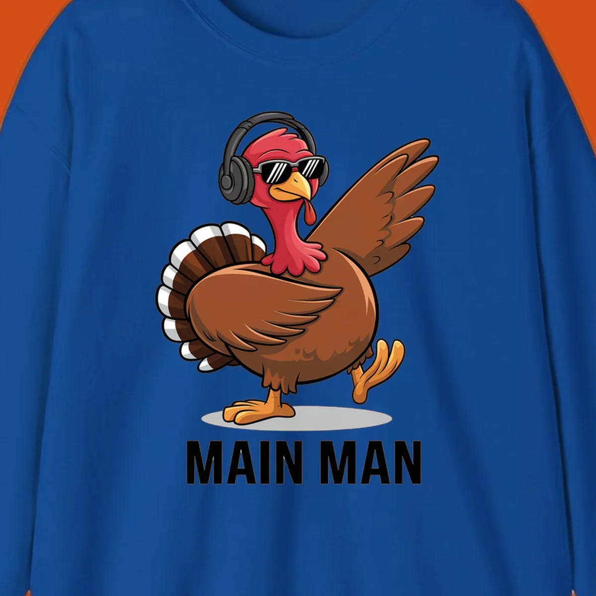 Cool dancing turkey wearing headphones and sunglasses with text 'MAIN MAN'.