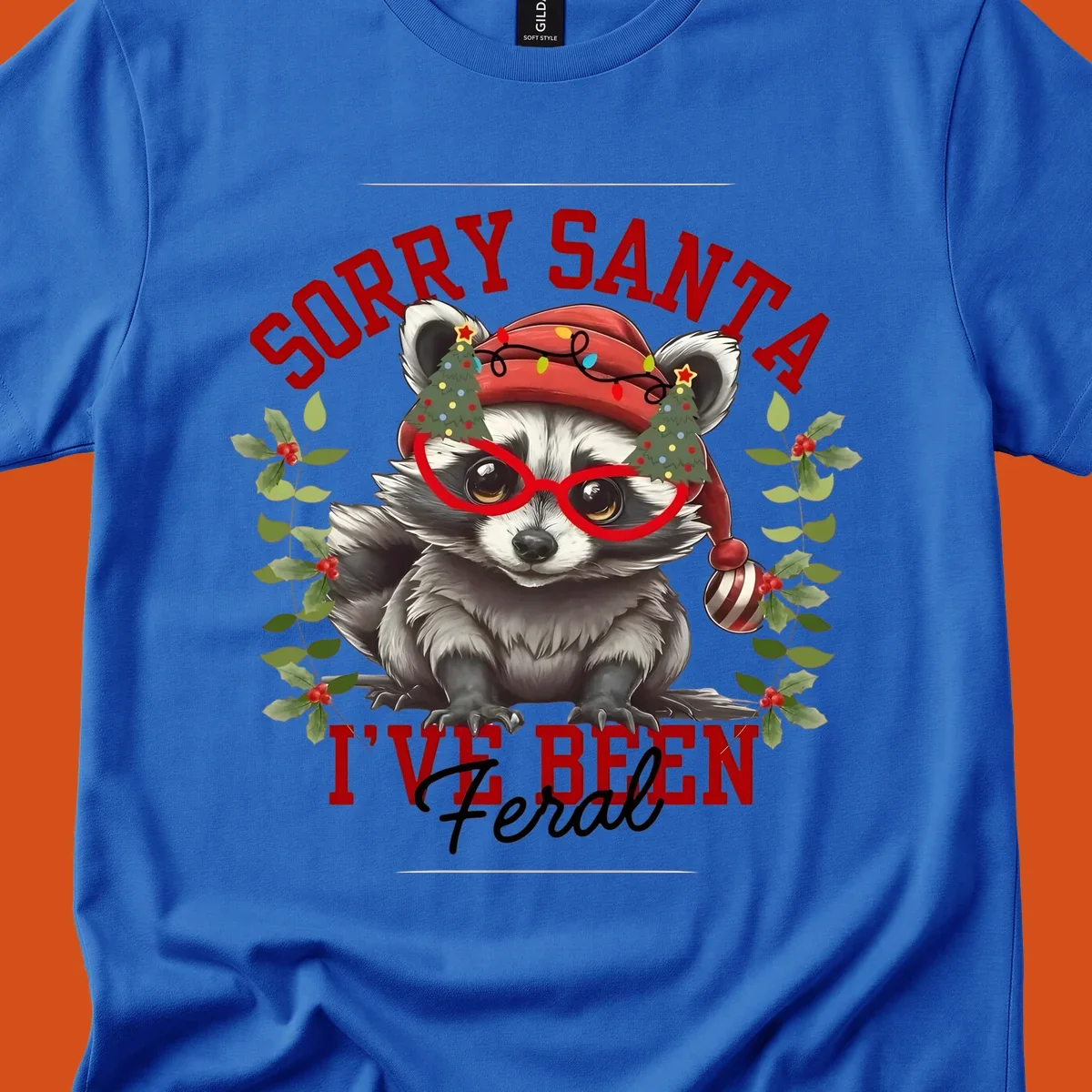 Sorry Santa I've Been Feral Raccoon Christmas design with a raccoon wearing a Santa hat and funny glasses.