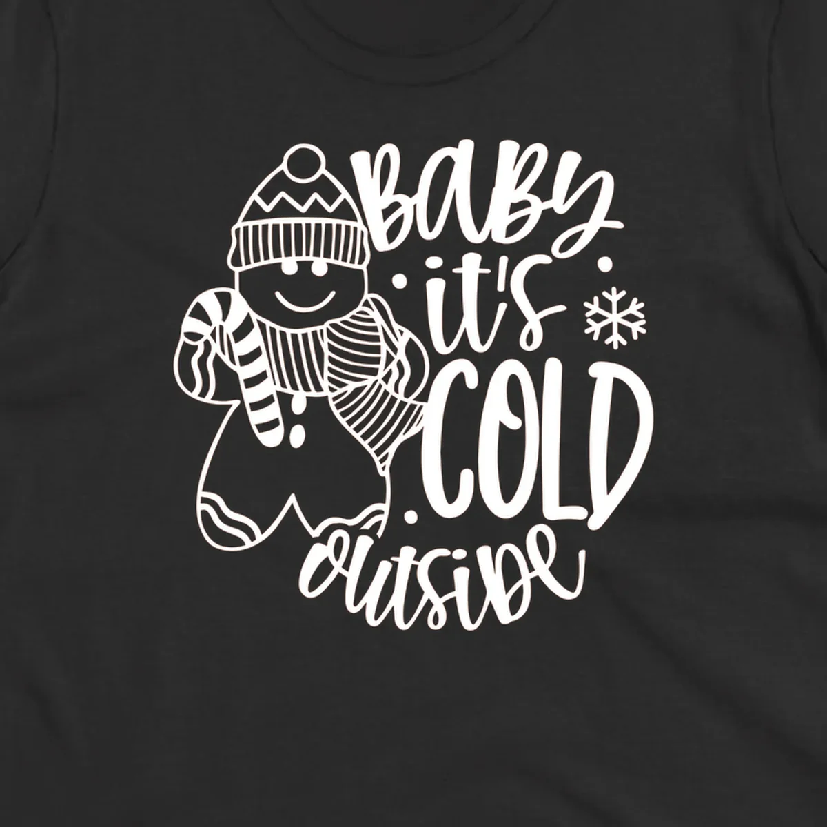 Baby it's cold outside gingerbread man with snowflake graphic.