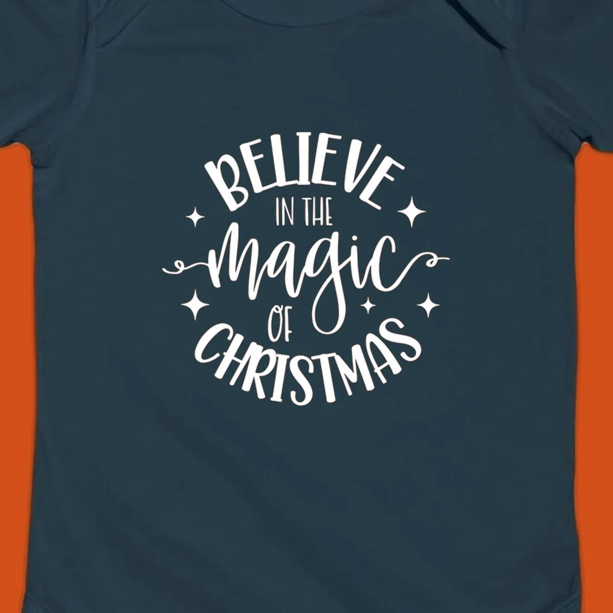 Believe in the magic of Christmas text with stars, holiday graphic.