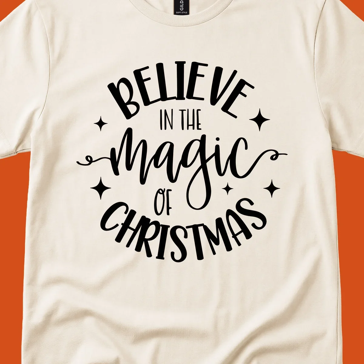 Believe in the magic of Christmas text with stars, holiday graphic.