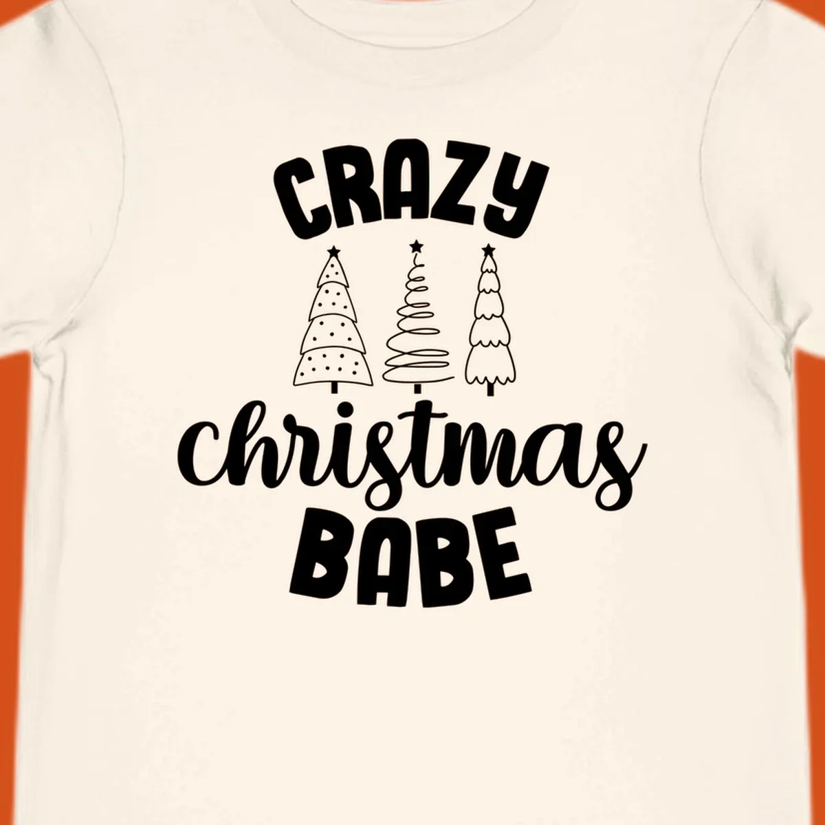 Crazy Christmas Babe text with three Christmas trees illustration.