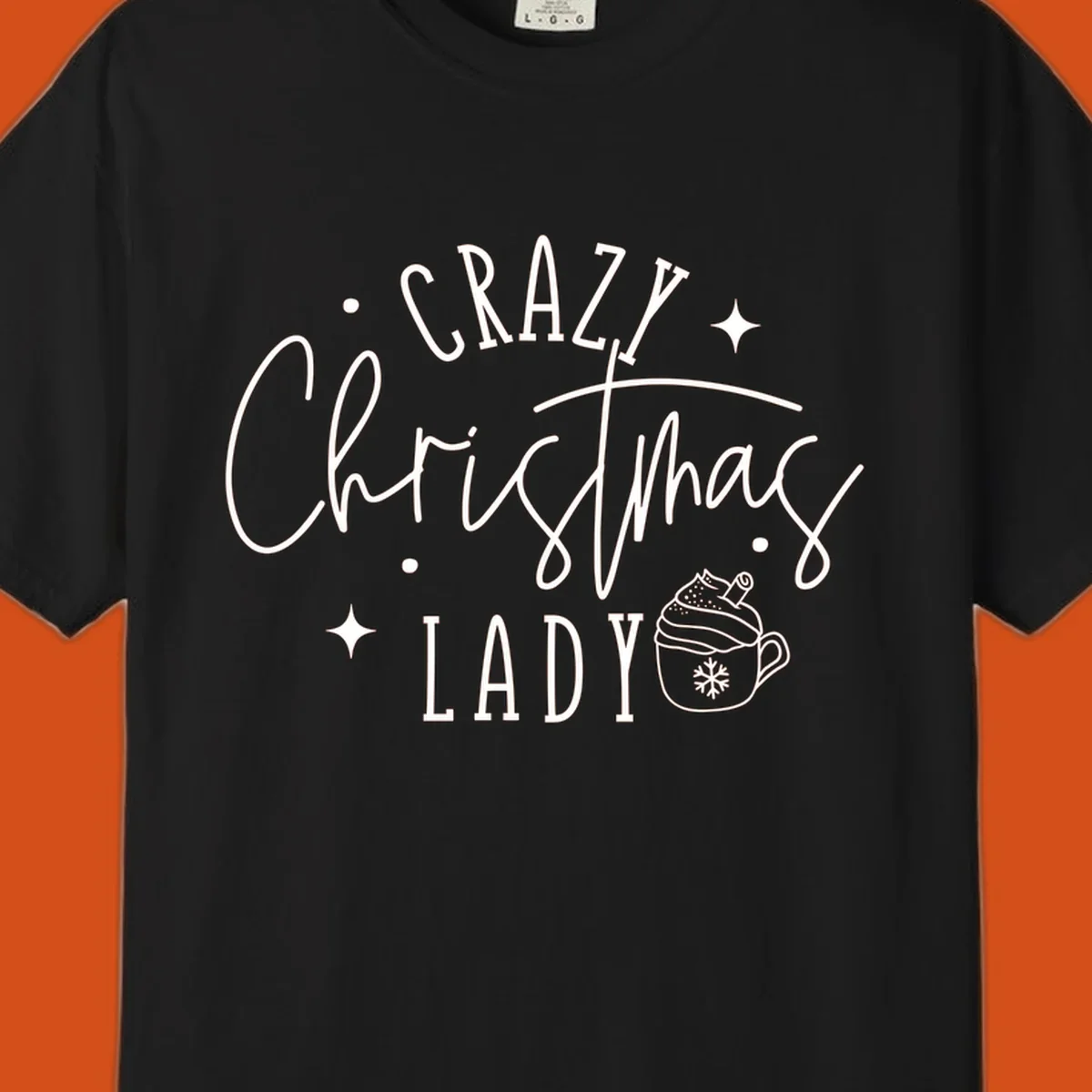 Crazy Christmas Lady text with a festive mug and stars design.
