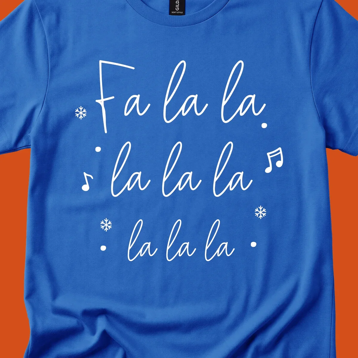 Fa la la Christmas carol lyrics with snowflakes and music notes