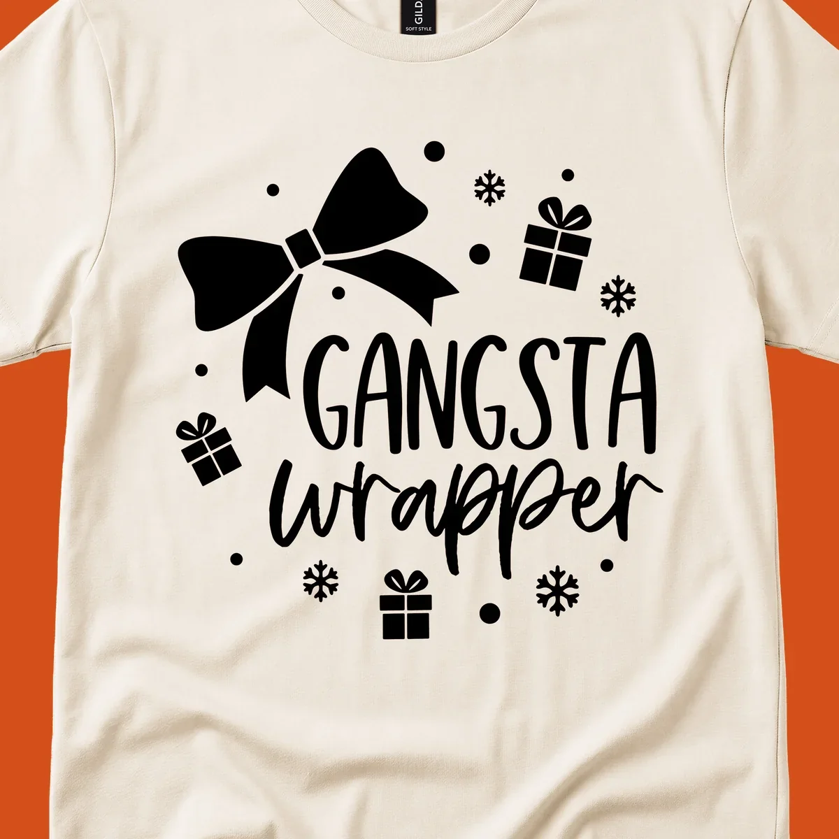 Gangsta wrapper holiday design with text, bow, gifts, and snowflakes.