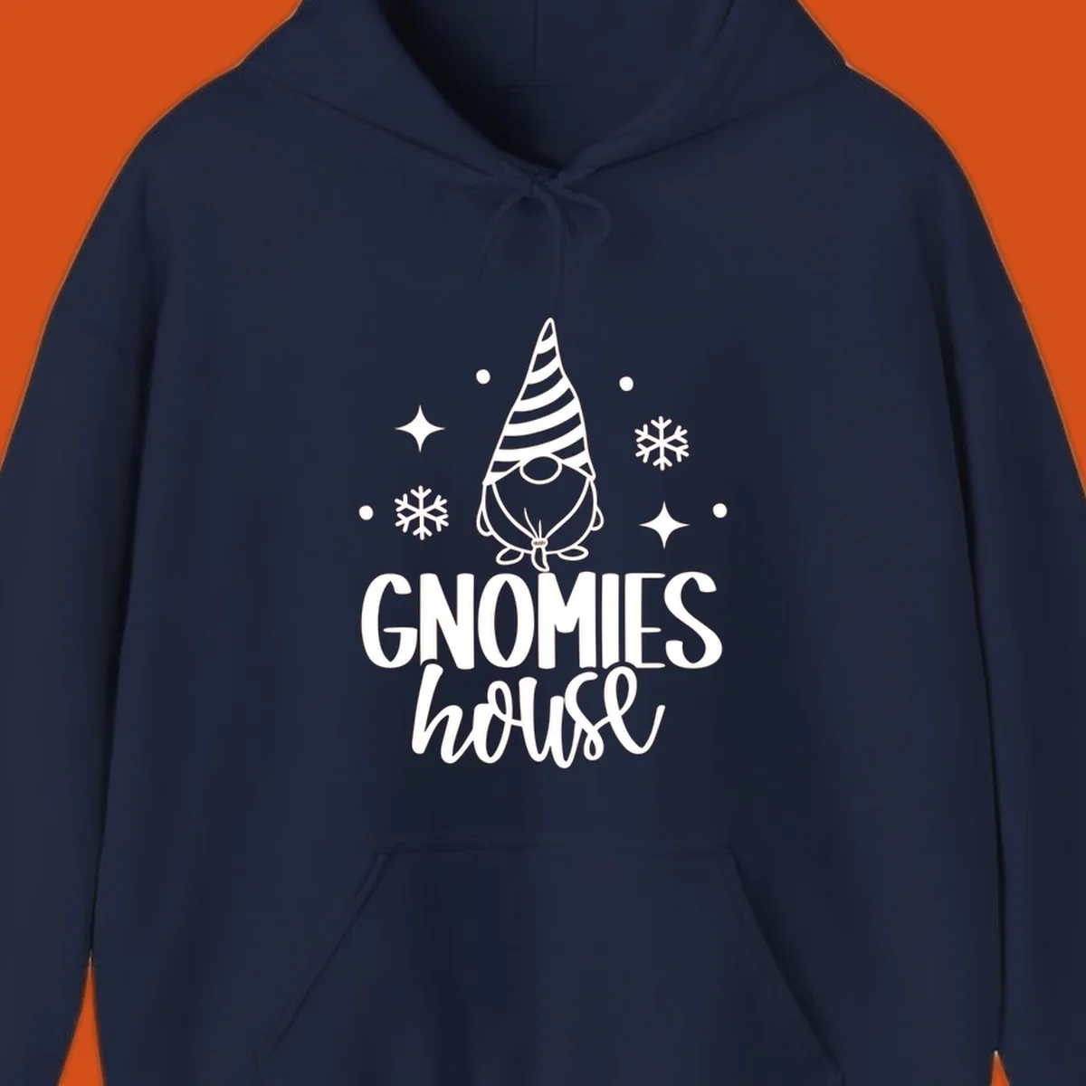 Illustration of a gnome with text 'GNOMIES house', surrounded by winter elements.