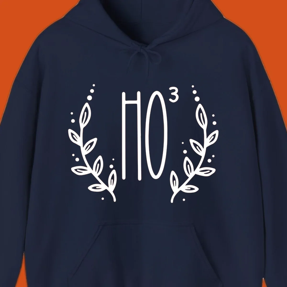 The Holiday Tee logo with stylized text HO³ framed by decorative branches.