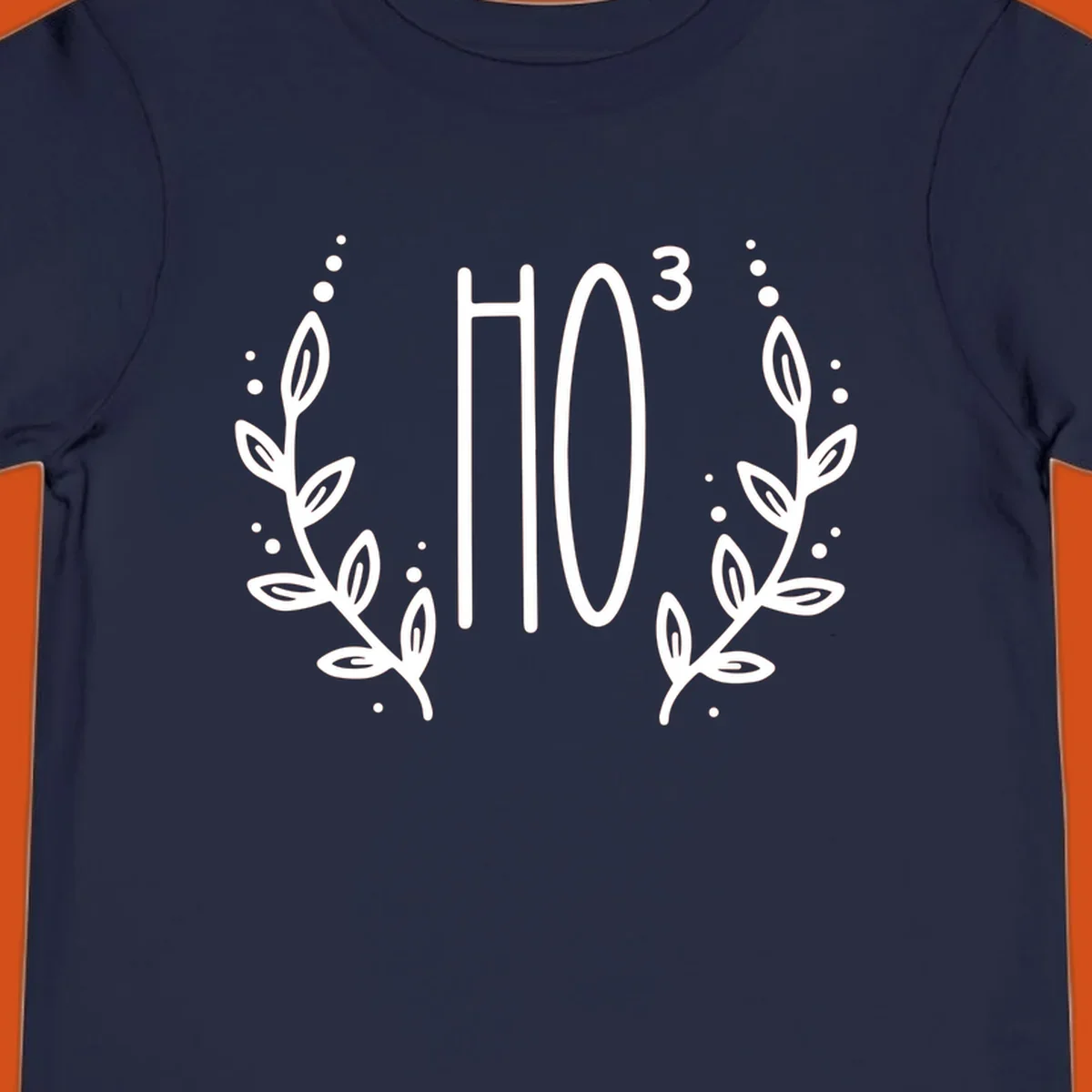 The Holiday Tee logo with stylized text HO³ framed by decorative branches.