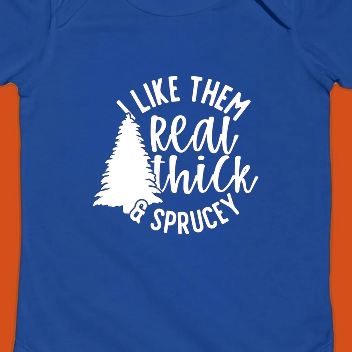 Illustration of a Christmas tree with text 'I like them real thick & sprucey', for thick-sprucey-christmas designs.