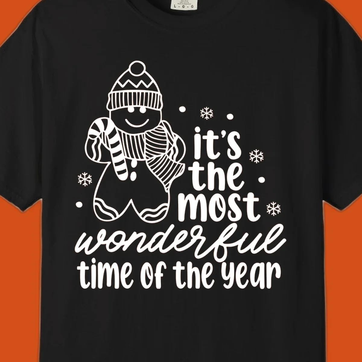 Christmas gingerbread man with 'it's the most wonderful time of the year' text.
