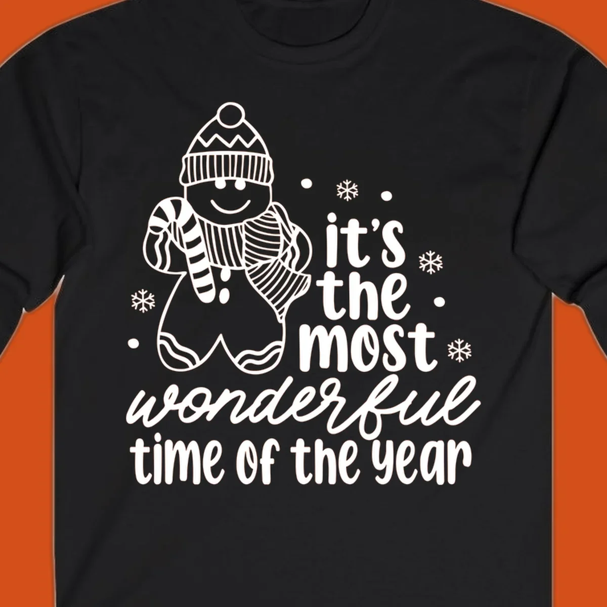 Christmas gingerbread man with 'it's the most wonderful time of the year' text.