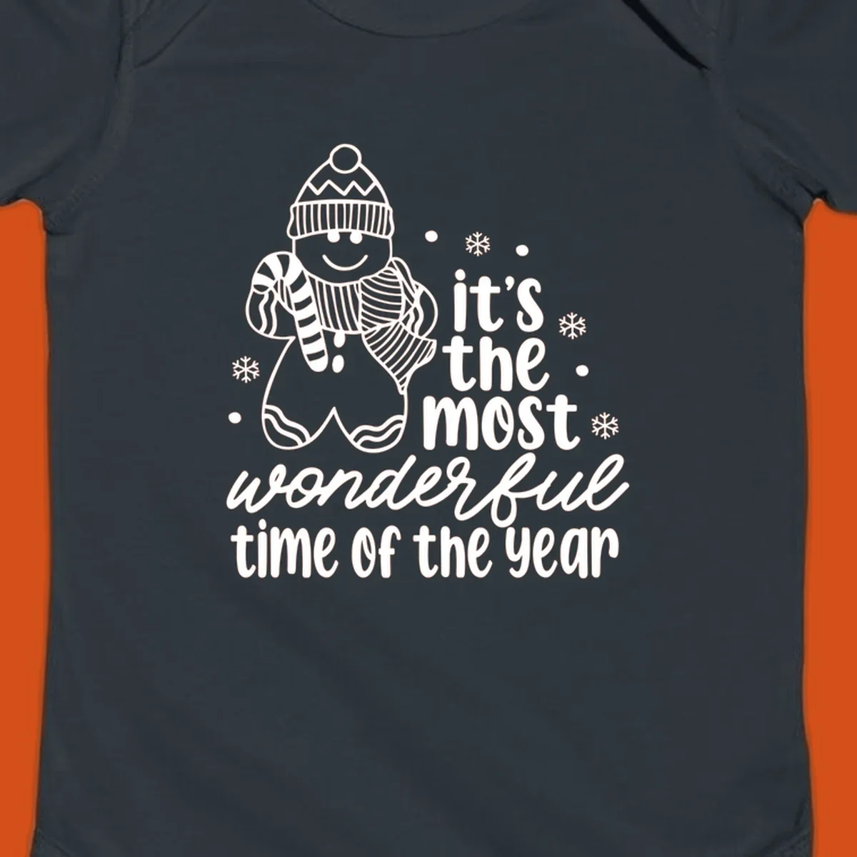 Christmas gingerbread man with 'it's the most wonderful time of the year' text.