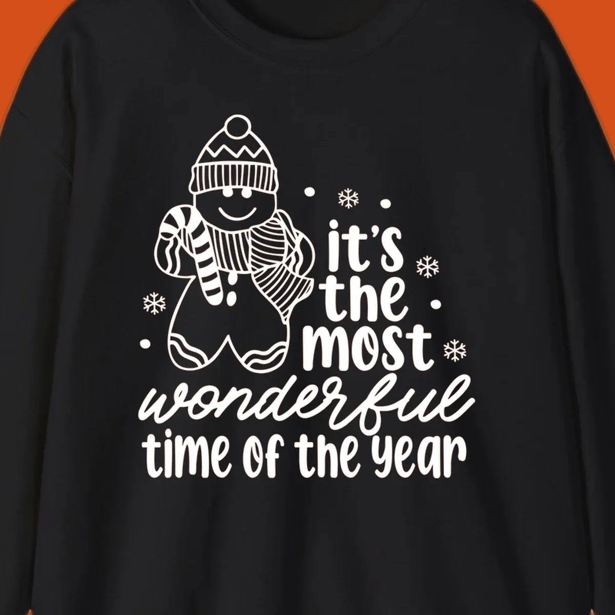 Christmas gingerbread man with 'it's the most wonderful time of the year' text.