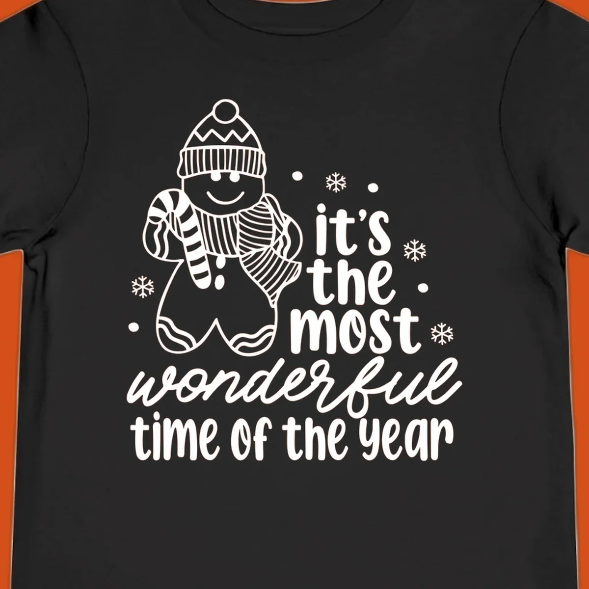 Christmas gingerbread man with 'it's the most wonderful time of the year' text.