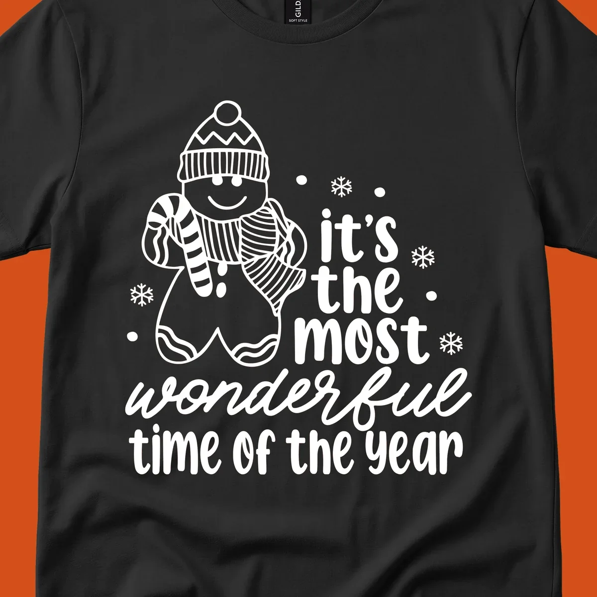 Christmas gingerbread man with 'it's the most wonderful time of the year' text.