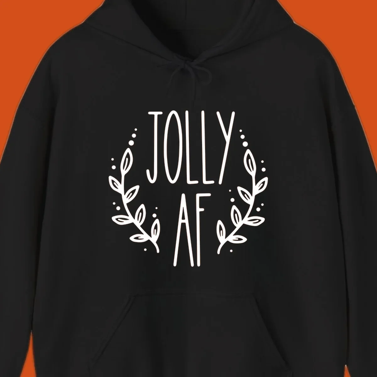 Jolly AF Christmas wreath design with text and leaves.