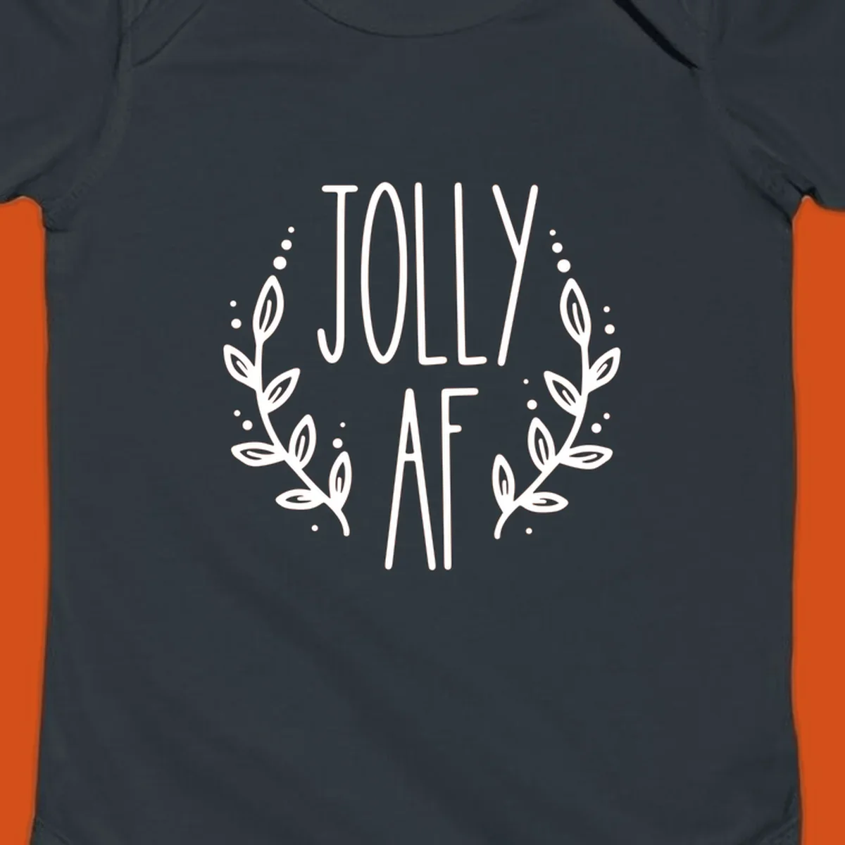 Jolly AF Christmas wreath design with text and leaves.