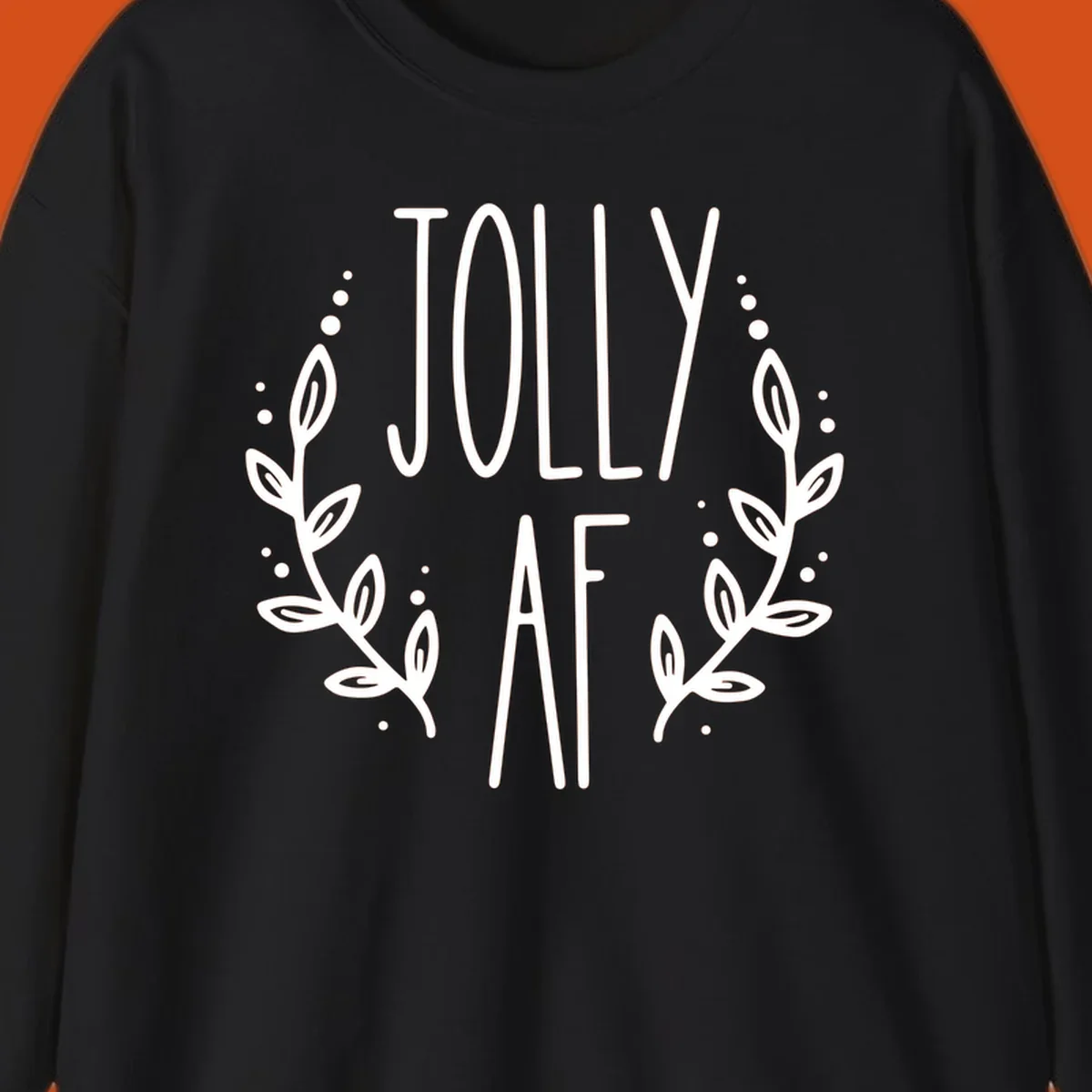 Jolly AF Christmas wreath design with text and leaves.
