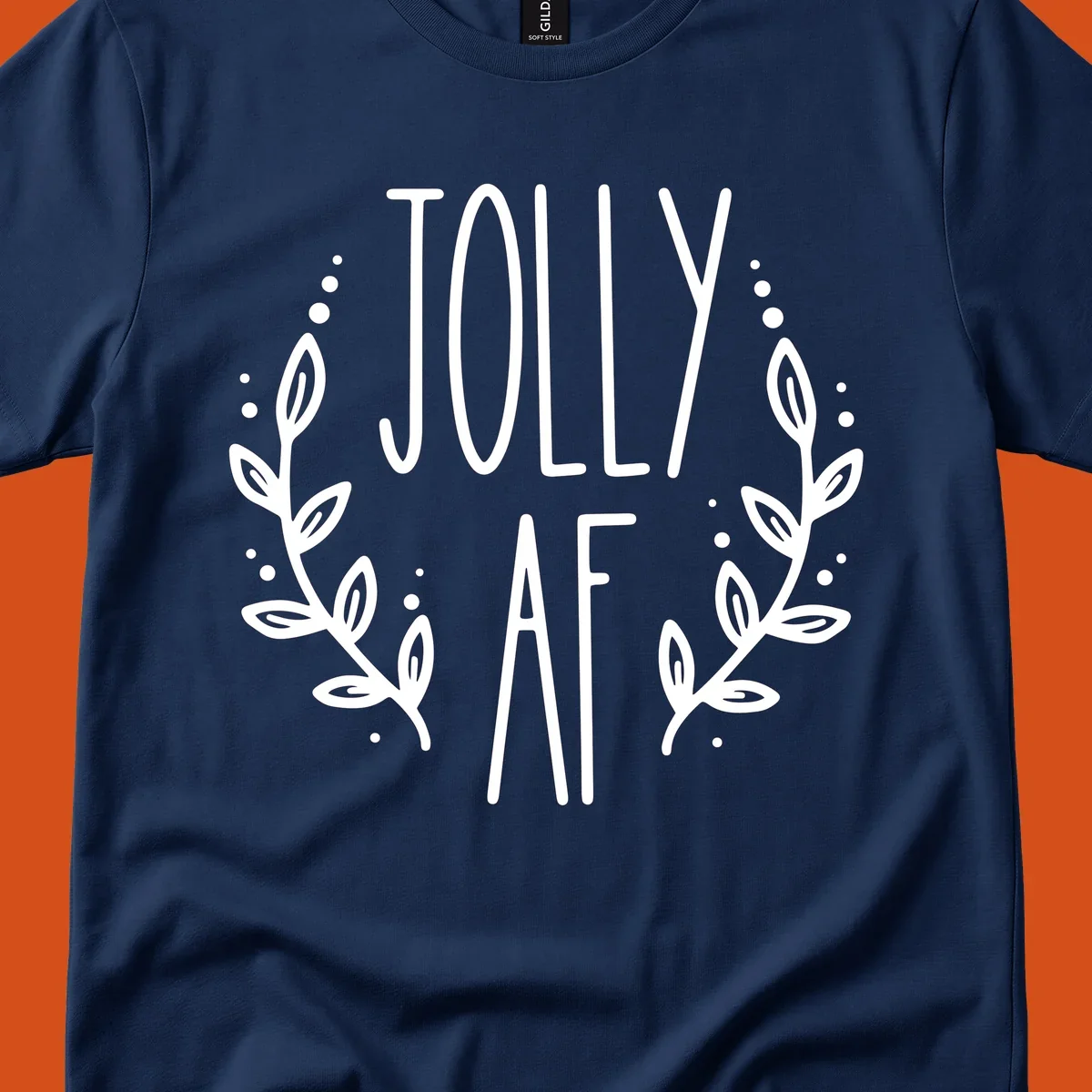 Jolly AF Christmas wreath design with text and leaves.