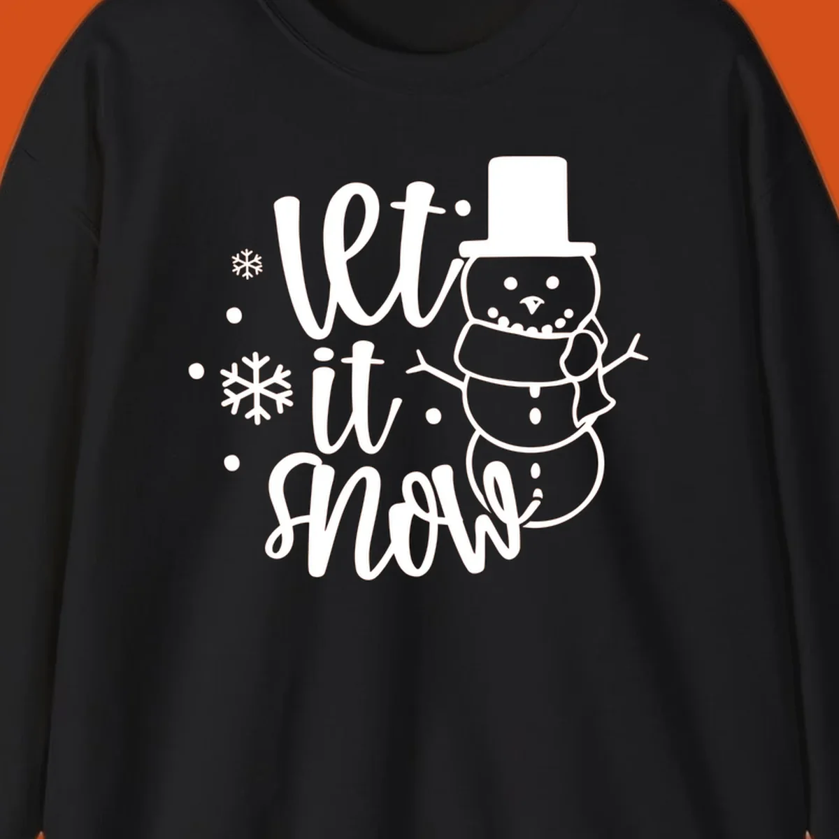 Let it snow snowman graphic with snowflakes, white on black.