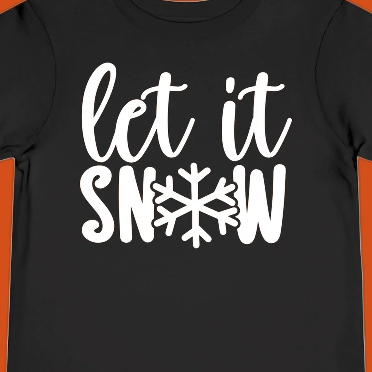 Let it snow text with a snowflake graphic, holiday design